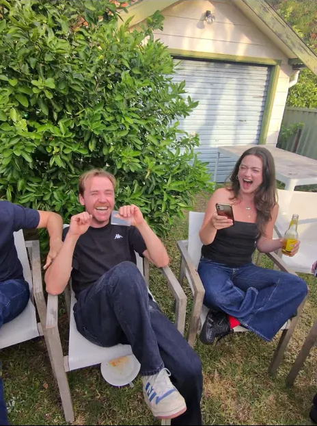 House party — guests in a living room